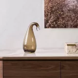 الفئات الزجاجات وحاملاتها image